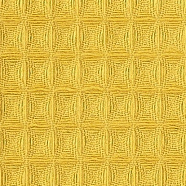 Stoff Waffel Piqué senf MWM SSS079 von KraftKids: Hochwertiger, gelb strukturierter 100% Baumwolle-Stoff mit zeitlosem, geometrischem Waffelmuster und markanter 3D-Optik für einen modernen, taktilen Look.